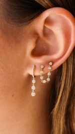 14K Gold  Triple Bezel Graduated Diamond Hoop Earring - Image 2