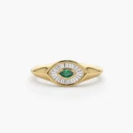 14k Marquise Shaped Emerald and Baguette Diamond Ring