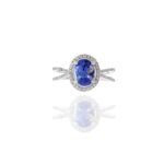 18K Solid Gold Oval Cut Tanzanite And Diamond Ring - Image 2